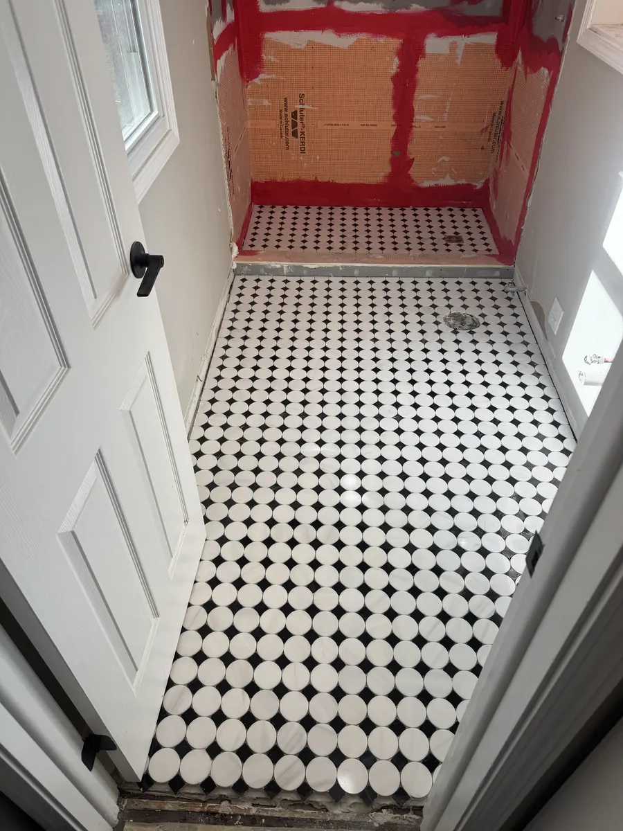 Bathroom floor tile close-up during installation